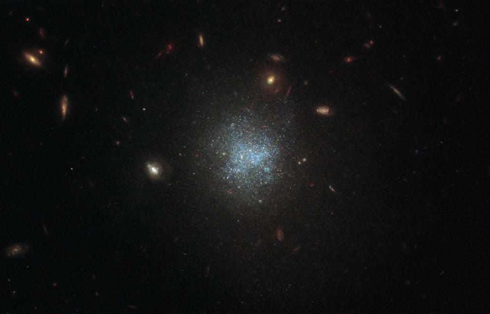 Hubble Detects Faint Galaxy in ‘Sea Monster’ Constellation